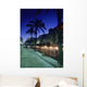 Palm Tree Lined Promenade With People Eating In Restaurants At Dusk Wall Mural