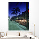 Palm Tree Lined Promenade With People Eating In Restaurants At Dusk Wall Mural
