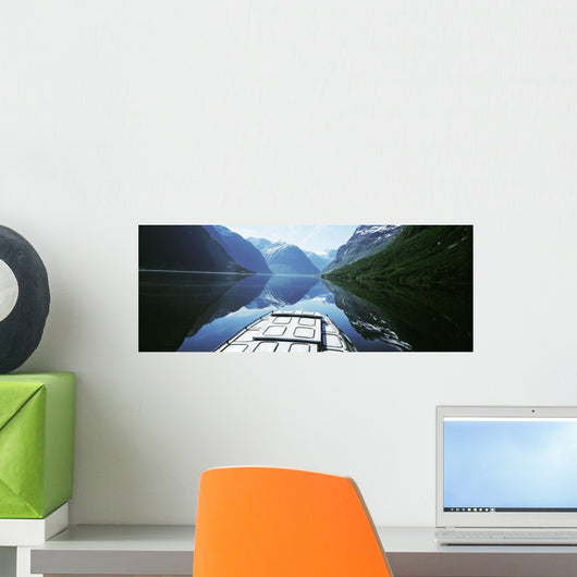 Boat Traveling Through Lavtn Lake Wall Mural