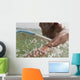 A Man Paddling On His Surfboard Off Valdevequeros Beach Wall Mural