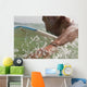 A Man Paddling On His Surfboard Off Valdevequeros Beach Wall Mural