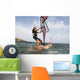 A Man Surfing Off The Coast Of Parque Natural Del Estrecho Wall Mural
