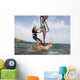 A Man Surfing Off The Coast Of Parque Natural Del Estrecho Wall Mural