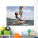 A Man Surfing Off The Coast Of Parque Natural Del Estrecho Wall Mural