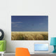 A Swallow Flying Low Over A Barley Field Wall Mural