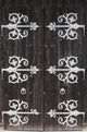 Large Metal Decorative Hinges On A Weathered Wooden Barn Door Wall Mural