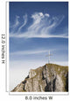 Mountain Peak With A Cross On Top Against A Blue Sky With Clouds Wall Mural