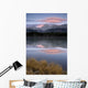 Partially Frozen Spillway Lake At Sunset Wall Mural