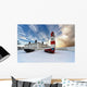 Boats Sitting On A Frozen Surface With A Lighthouse And Building Wall Mural