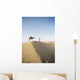 Lonely Traveler with Camel through Desert Wall Mural