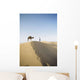 Lonely Traveler with Camel through Desert Wall Mural