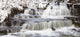Waterfalls With Fresh Snow Wall Mural