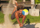 A Man Diving For A Beach Ball Wall Mural