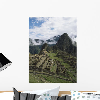 Machu Picchu Wall Mural shown on a wall