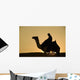 Man On Camel At Dusk Near The Pyramids Wall Mural