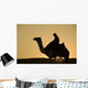 Man On Camel At Dusk Near The Pyramids Wall Mural