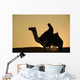 Man On Camel At Dusk Near The Pyramids Wall Mural