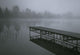 Dock With Fog Over Lake Wall Mural