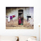 Woman In Front Of The House Wall Mural