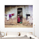 Woman In Front Of The House Wall Mural