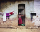 Woman In Front Of The House Wall Mural