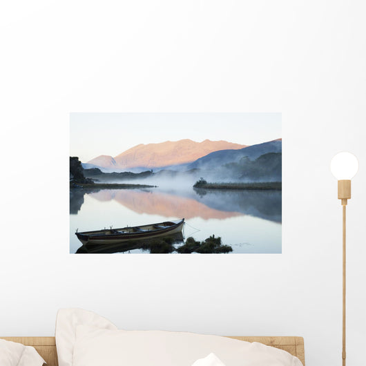 Boat On A Tranquil Lake Wall Mural