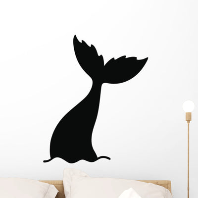 Diving Mermaids Tail Wall Decal shown on a wall
