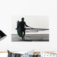 A Man Walking On The Beach Carrying A Kite Surfboard Wall Mural