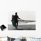 A Man Walking On The Beach Carrying A Kite Surfboard Wall Mural