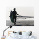 A Man Walking On The Beach Carrying A Kite Surfboard Wall Mural