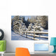 Snow-Covered Evergreens And Rustic Fence Wall Mural