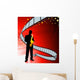 Saxophone player on film reel background Wall Mural