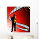 Saxophone player on film reel background Wall Mural