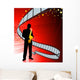 Saxophone player on film reel background Wall Mural