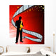 Saxophone player on film reel background Wall Mural