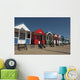 Traditional beach huts on the seafront at Southwold, Suffolk, UK Wall Mural