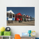 Traditional beach huts on the seafront at Southwold, Suffolk, UK Wall Mural