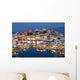 Greece, Crete, View of Lake Vouismeni and town at dusk Wall Mural