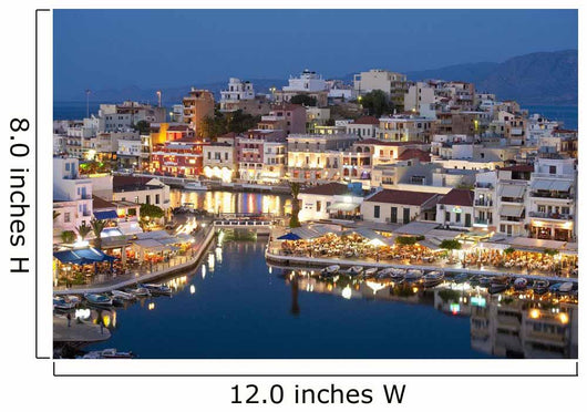 Greece, Crete, View of Lake Vouismeni and town at dusk Wall Mural