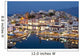 Greece, Crete, View of Lake Vouismeni and town at dusk Wall Mural