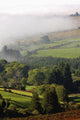 Fog Rolling Into Nire Valley Wall Mural