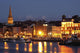 Boats Moored On River Suir At City Waterfront At Night Wall Mural