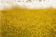 Close-Up Of Beer Bubbles And Foam In A Glass Wall Mural