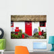 Traditional Irish Cottage With A Red Door And Red Decorative Items Wall Mural