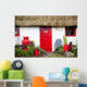 Traditional Irish Cottage With A Red Door And Red Decorative Items Wall Mural
