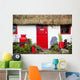 Traditional Irish Cottage With A Red Door And Red Decorative Items Wall Mural