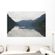 A Young Man Leaps Onto His Body Board In Cameron Lake Wall Mural