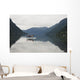 A Young Man Leaps Onto His Body Board In Cameron Lake Wall Mural