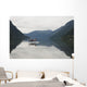 A Young Man Leaps Onto His Body Board In Cameron Lake Wall Mural