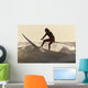 A Surfer Paddling On A Surfboard Off Benavides Beach Wall Mural